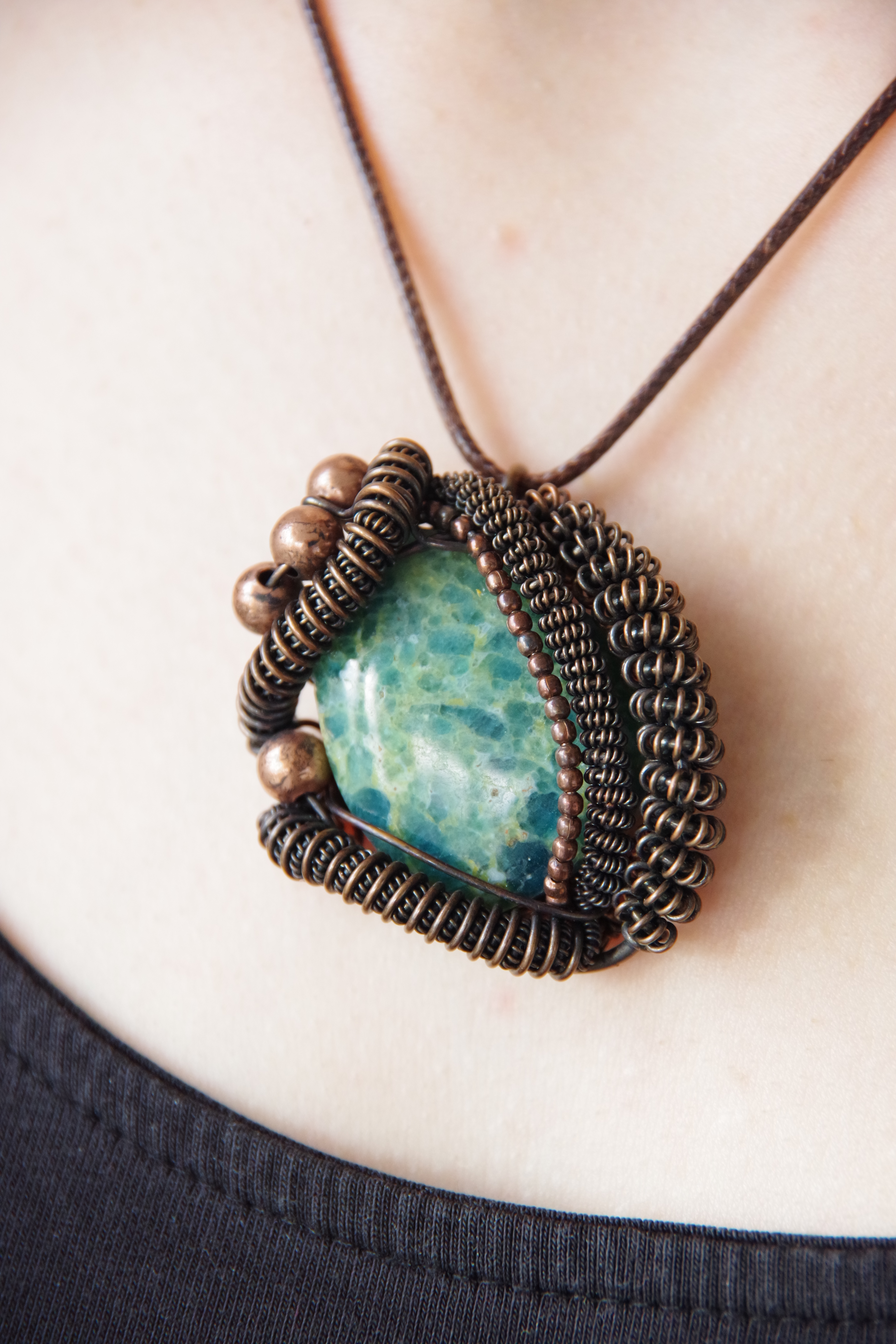 Natural Appatite set in antique copper wire with copper beads.